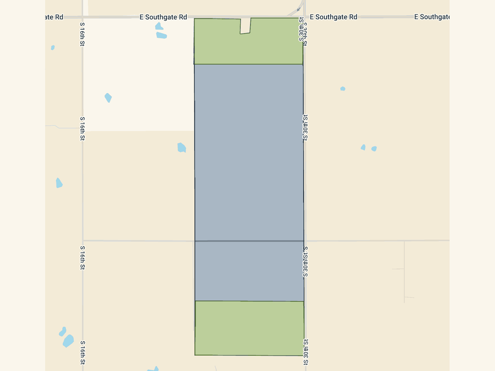 Parcel map of the proposed South campus, a north-south strip along South 30th Street from East Southgate Road southward. The northern end along Southgate and the southern end are both shaded green and held as agricultural.