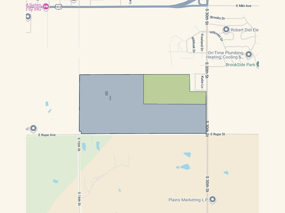 Parcel map of the proposed West campus along East Rupe Avenue between South 16th and South 30th Streets. The northeast corner nearest the Brookside neighbourhood is shaded green and held as agricultural.